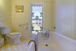 The 3rd upstairs bath is shared with bedrooms 3 and 4 and has a clawfoot tub